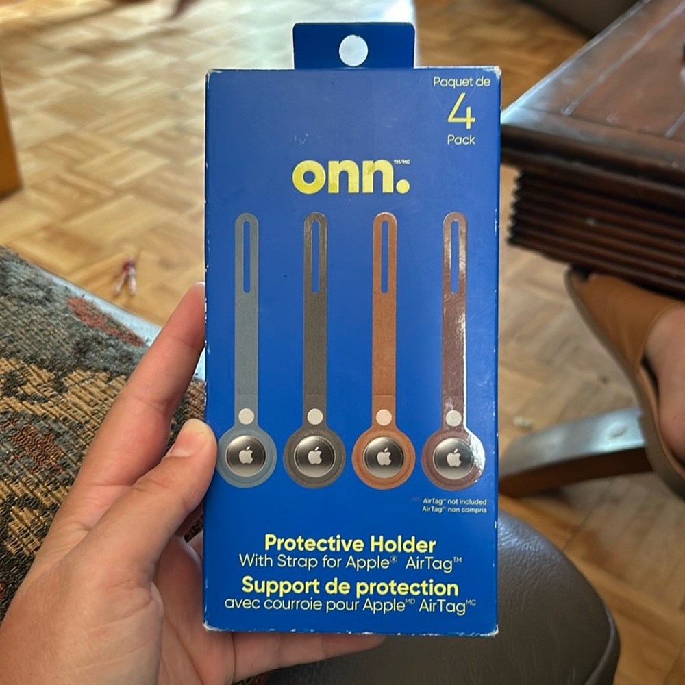 NEW ONN. 4-pack protective holder with strap for Apple AirTag